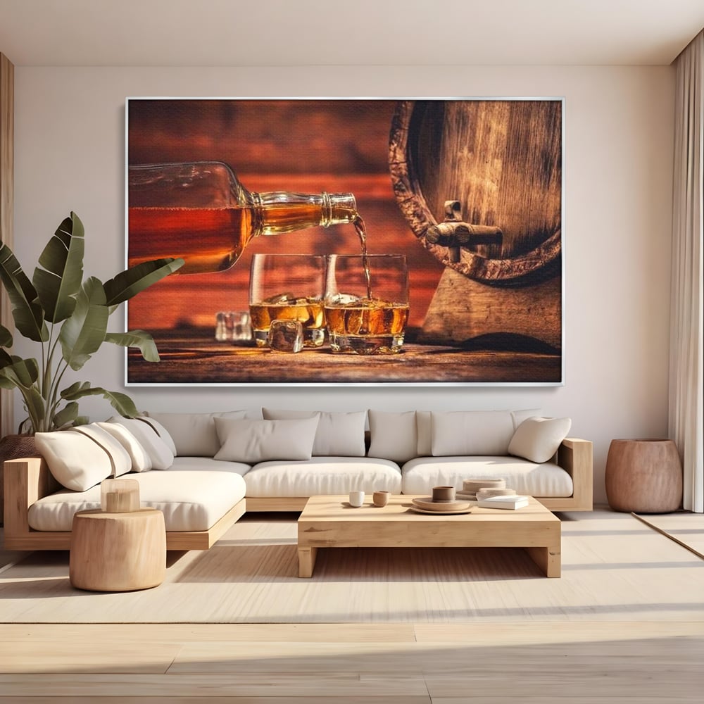 Tablou canvas cu tablou canvas cu whisky si butoi lemn, in rama de aluminiu argintiu, pe perete intr-un living